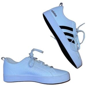 new white & black adidas superstars